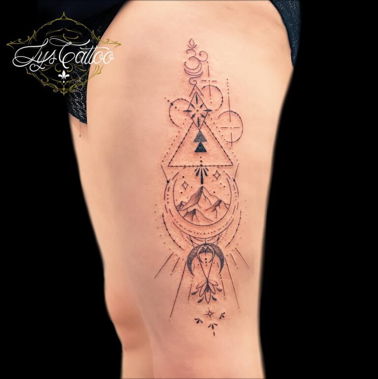 Tatouage géométrique spirituel avec montagne sur la cuisse