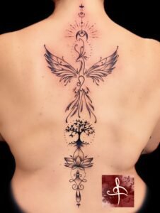 Tatouage spirituel représentant un phénix stylisé, un arbre de vie et une fleur de lotus, réalisé avec finesse et précision par Rhum1 Tattoo au Lys Tattoo.